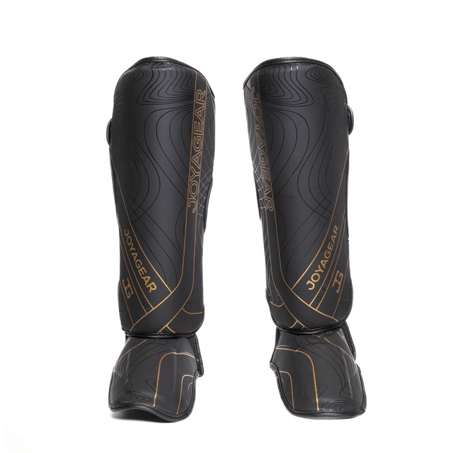 Joya ESSENTIAL Scheenbeschermers- Zwart/Goud